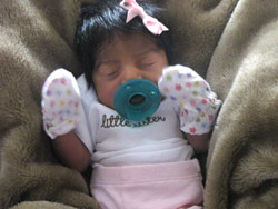 This photo of baby Makalya is proof you can have a baby after tubes and burned and cut..
